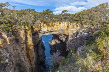 Breathtaking Tasman Arch in Tasmanian National Park.
