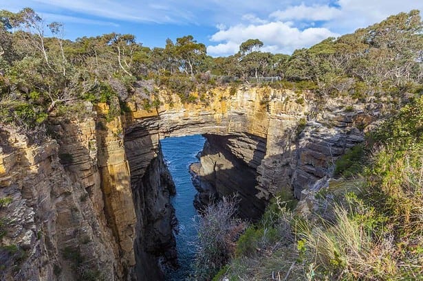 Breathtaking Tasman Arch in Tasmanian National Park.