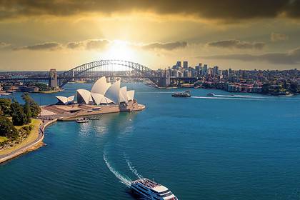 Sydney Opera House and Harbour Bridge at sunset.