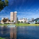Scenic Adelaide River Torrens with Cityscape.