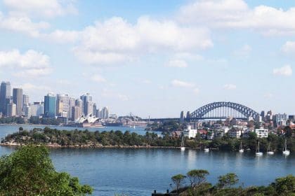 Sydney Harbour Bridge and city skyline view from the river.