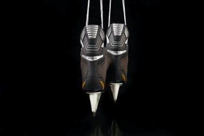 Ski Boots on Black Surface