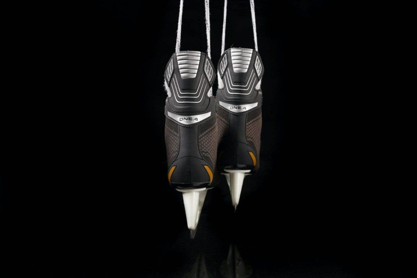 Ski Boots on Black Surface