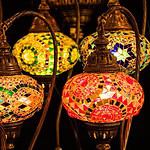 Colorful Turkish mosaic lamps glowing in the dark