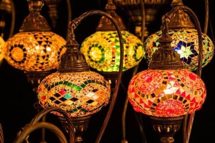 Colorful Turkish mosaic lamps glowing in the dark