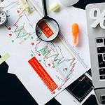magnifying glass on white paper