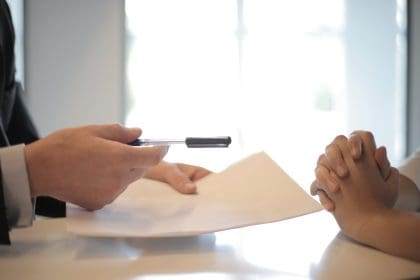 Business contract agreement in office setting