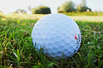close up golf ball on course